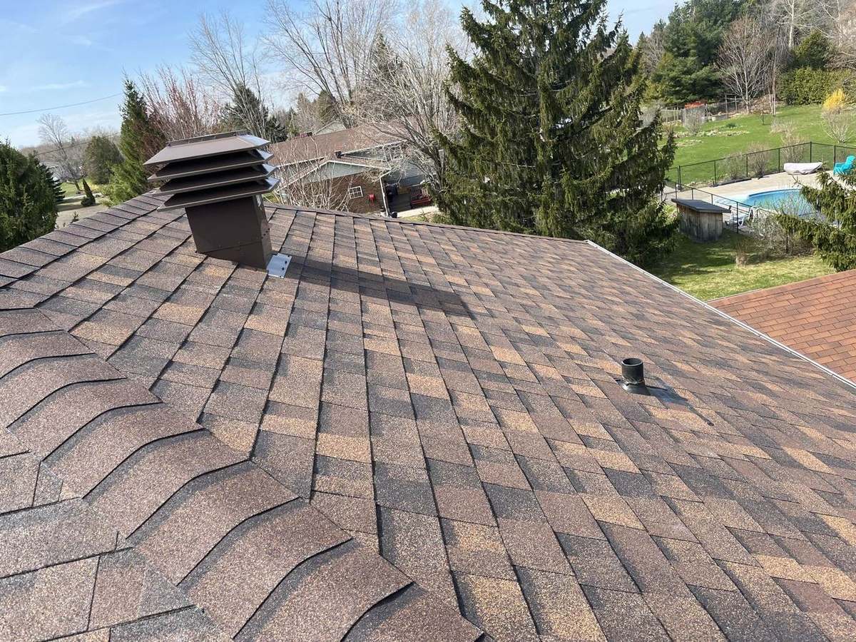 Brownwood asphalt shingle roof installed by Rob's Quality Roofing in the Ottawa region — project 3