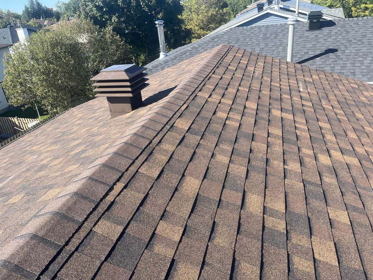 Brownwood asphalt shingle roof installed by Rob's Quality Roofing in the Ottawa region — project 6