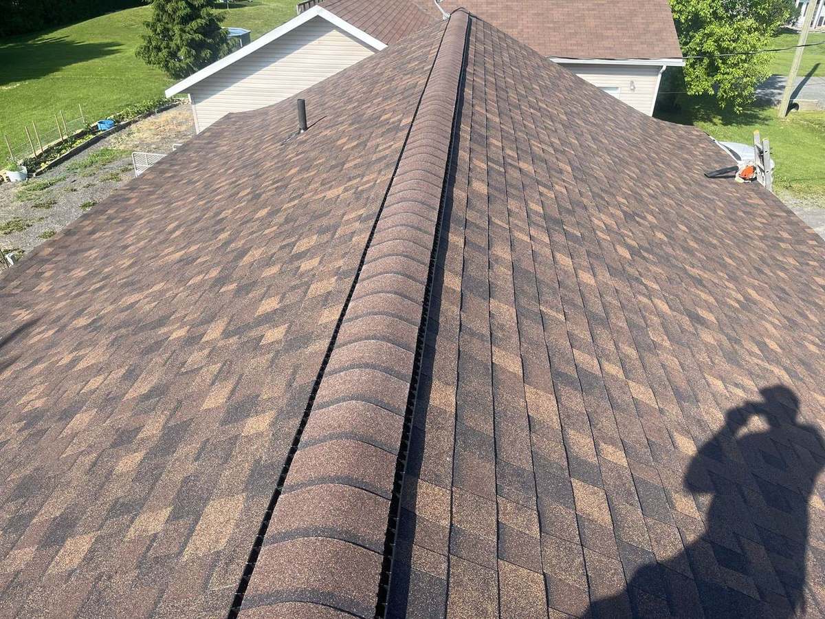 Brownwood asphalt shingle roof installed by Rob's Quality Roofing in the Ottawa region — project 7