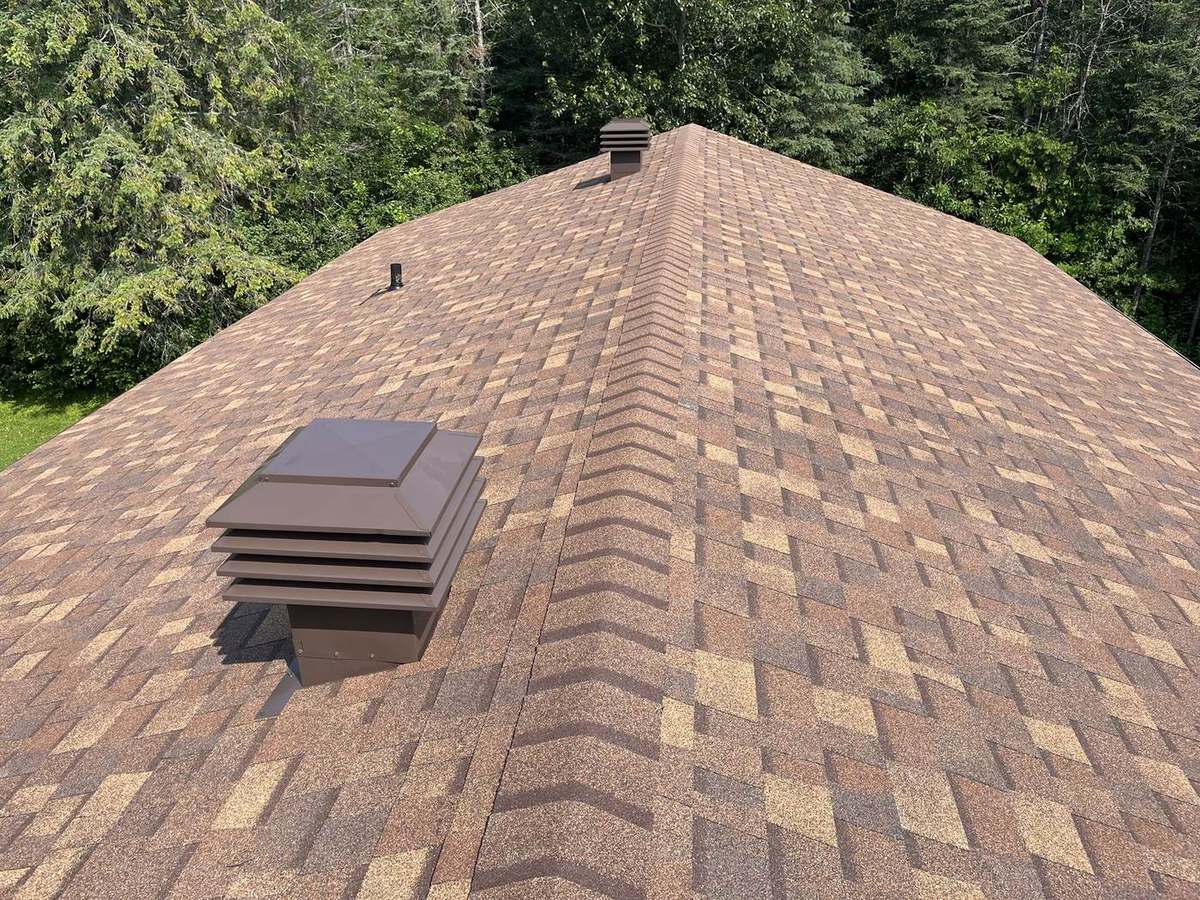Desert Rose asphalt shingle roof installed by Rob's Quality Roofing in the Ottawa region — project 1