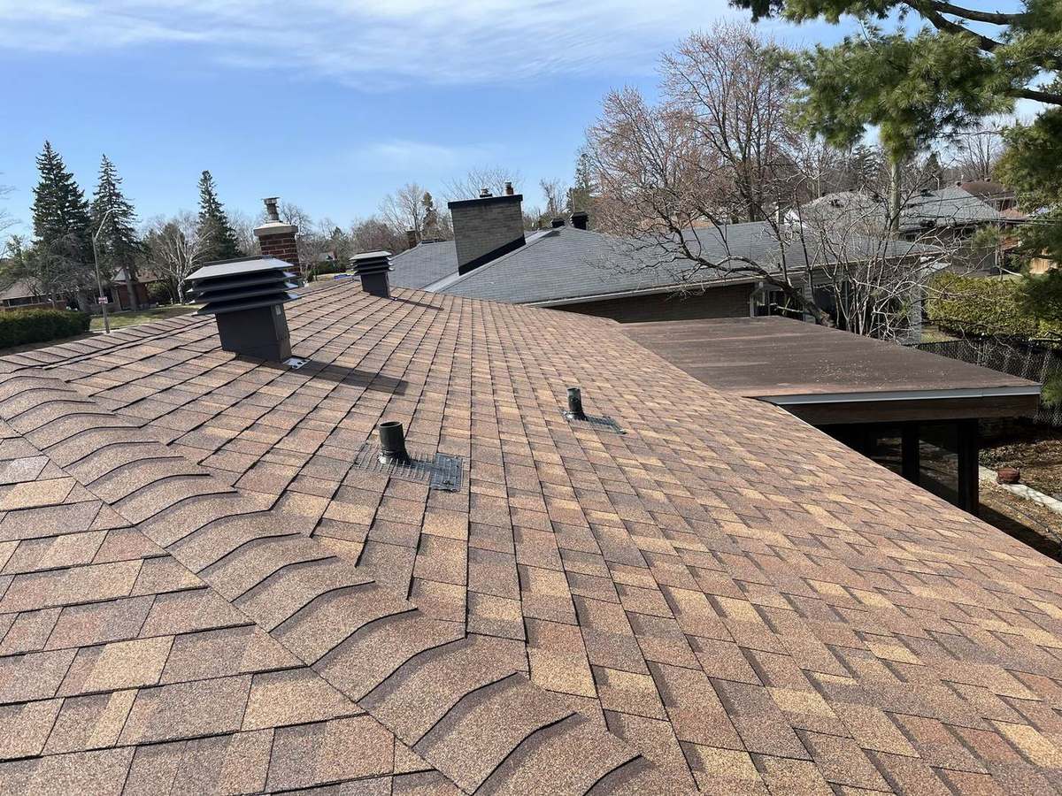 Desert Rose asphalt shingle roof installed by Rob's Quality Roofing in the Ottawa region — project 2