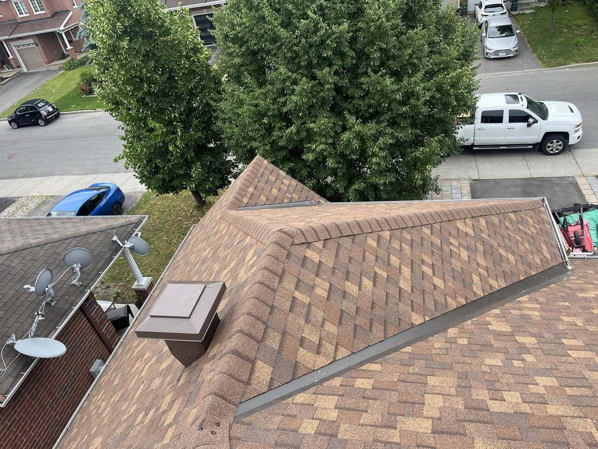 Desert Rose asphalt shingle roof installed by Rob's Quality Roofing in the Ottawa region — project 4