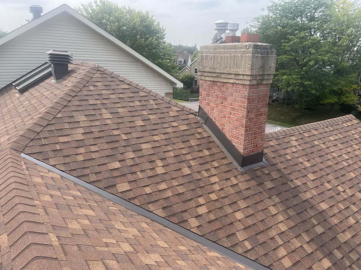 Desert Rose asphalt shingle roof installed by Rob's Quality Roofing in the Ottawa region — project 6