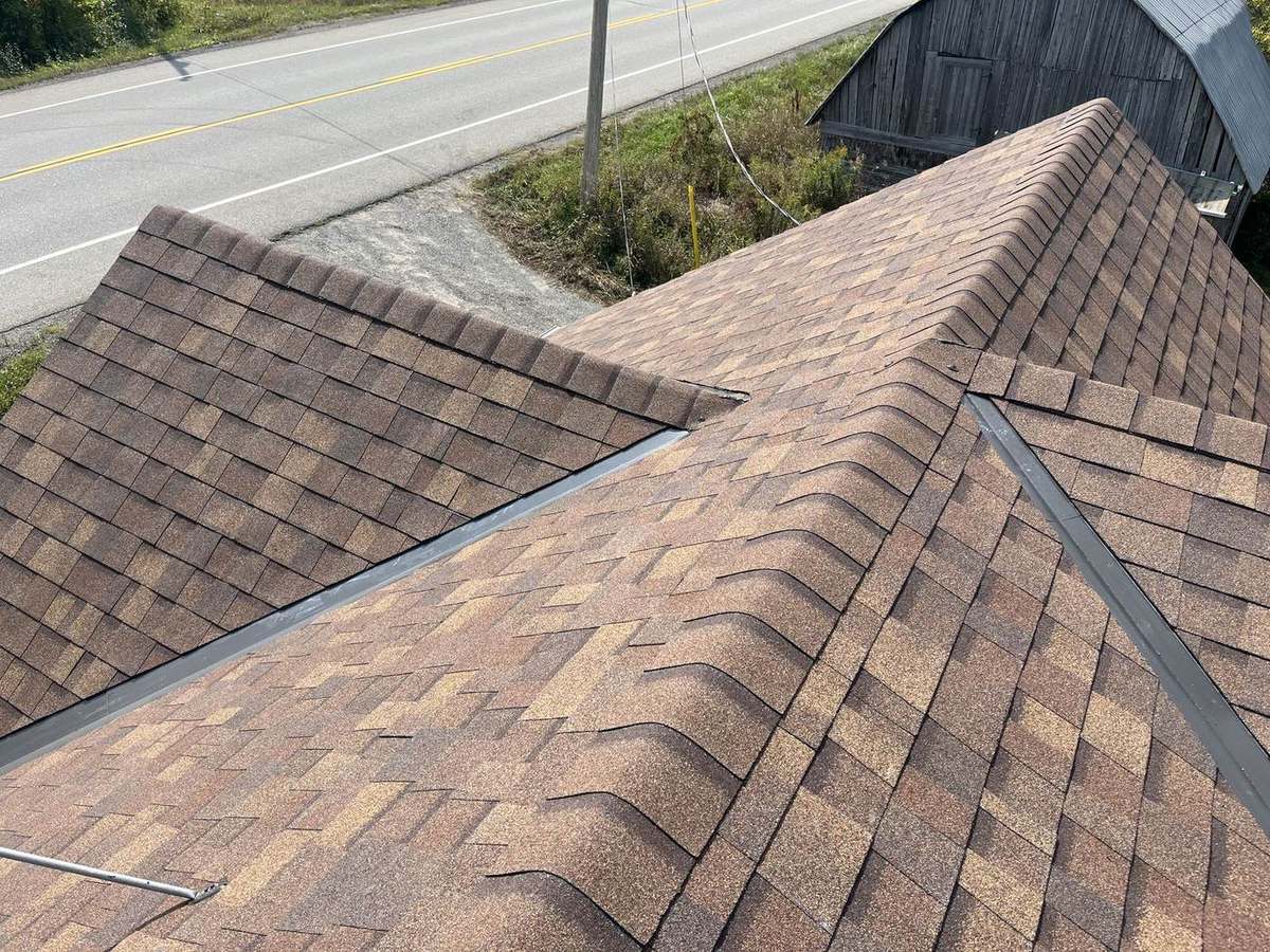Desert Rose asphalt shingle roof installed by Rob's Quality Roofing in the Ottawa region — project 7