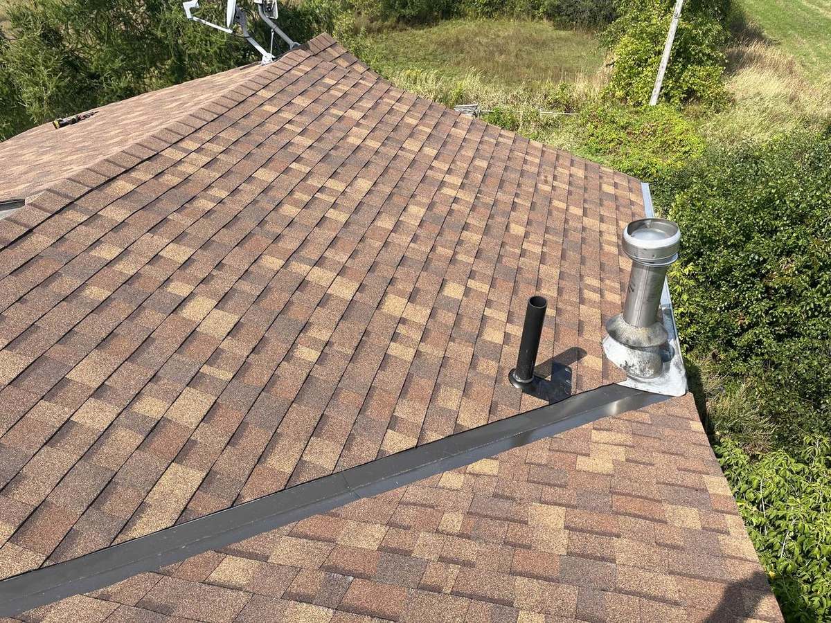 Desert Rose asphalt shingle roof installed by Rob's Quality Roofing in the Ottawa region — project 8