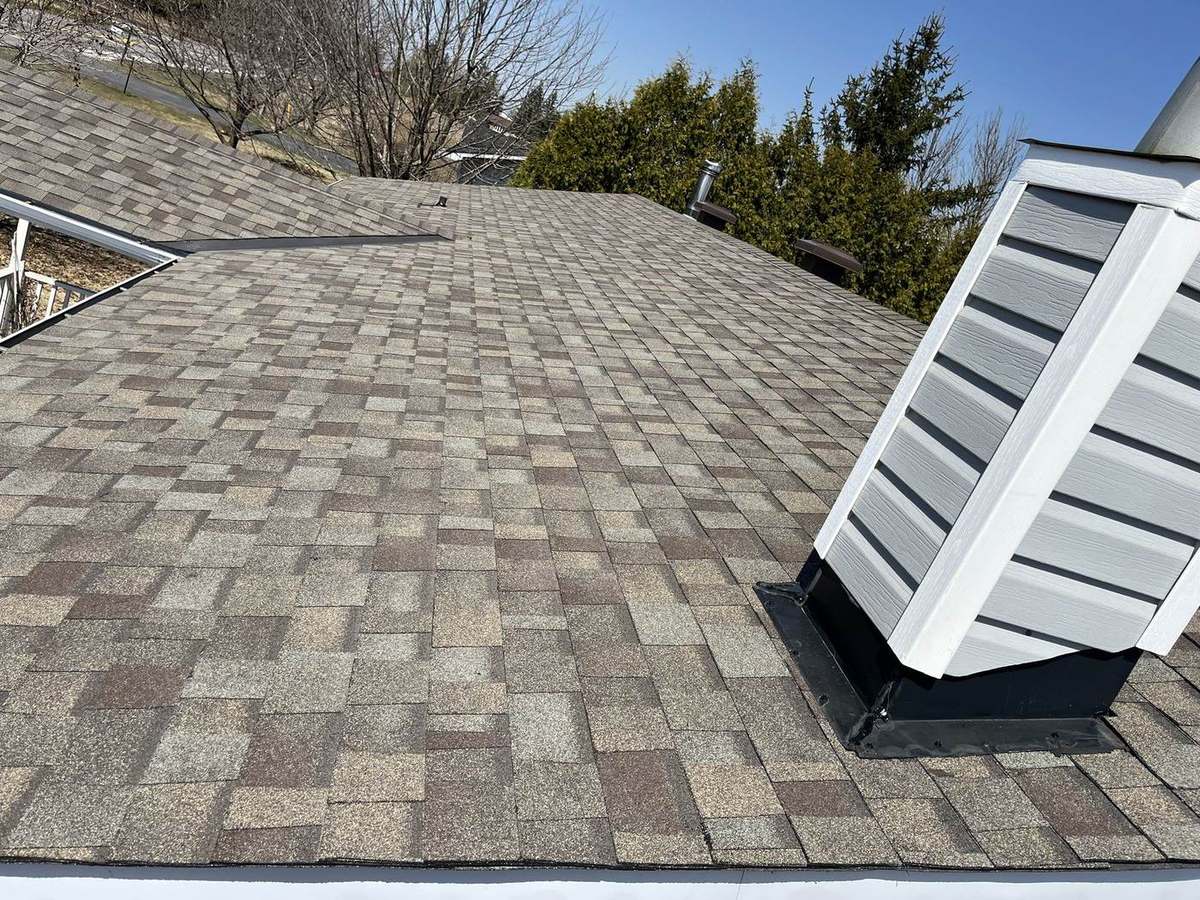 Driftwood asphalt shingle roof installed by Rob's Quality Roofing in the Ottawa region — project 1