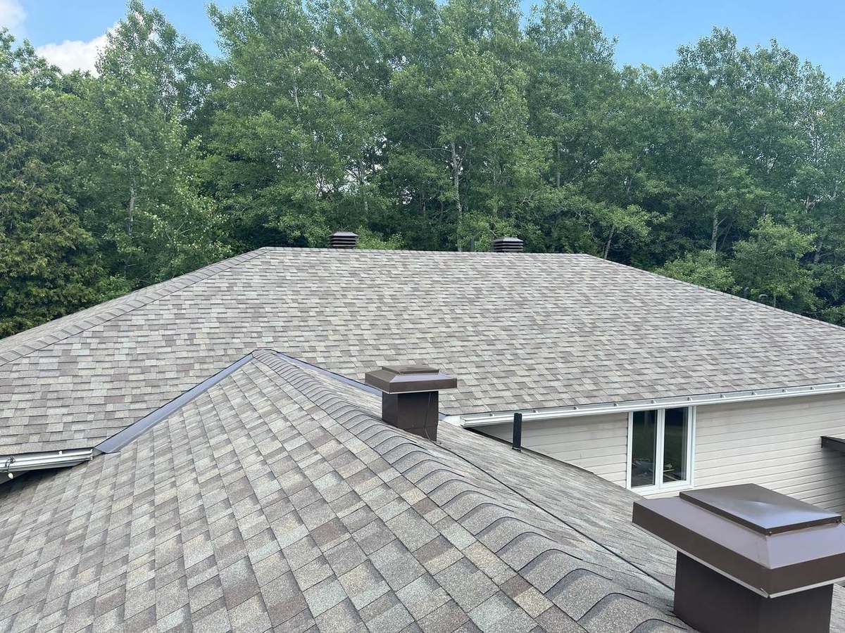 Driftwood asphalt shingle roof installed by Rob's Quality Roofing in the Ottawa region — project 2