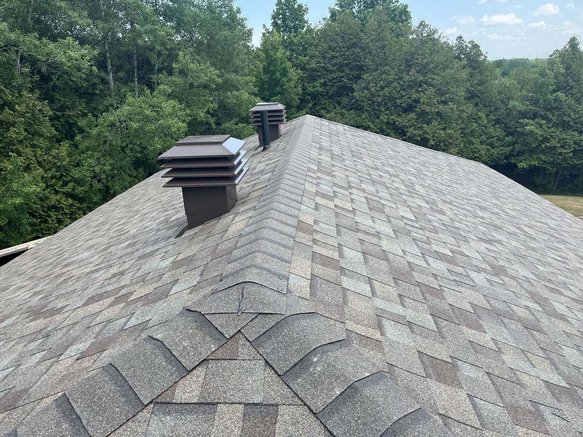 Driftwood asphalt shingle roof installed by Rob's Quality Roofing in the Ottawa region — project 3