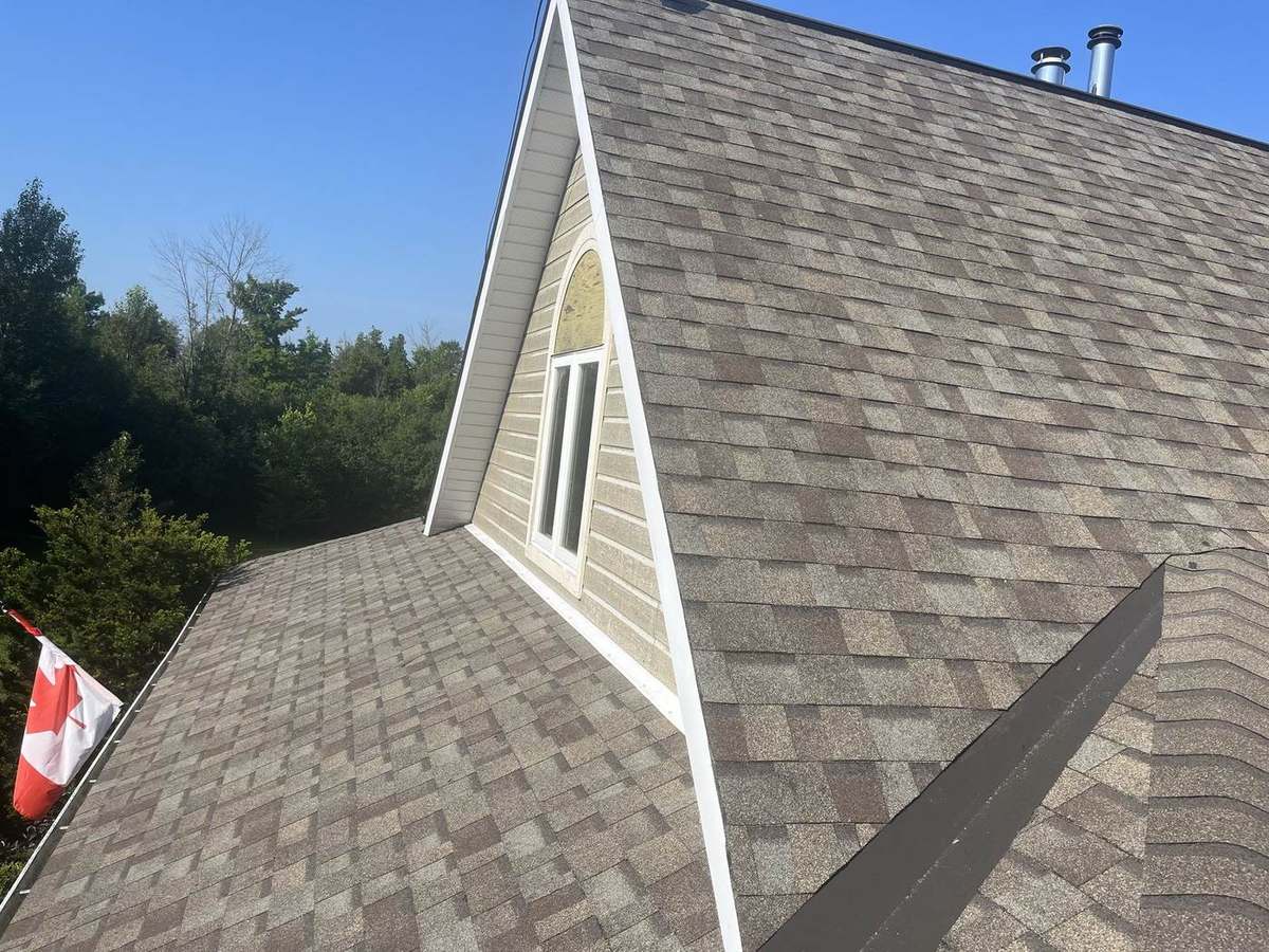 Driftwood asphalt shingle roof installed by Rob's Quality Roofing in the Ottawa region — project 5