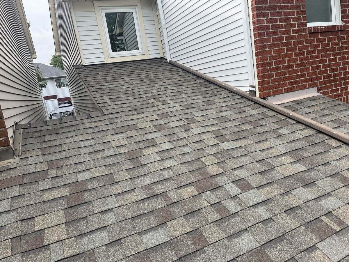 Driftwood asphalt shingle roof installed by Rob's Quality Roofing in the Ottawa region — project 6
