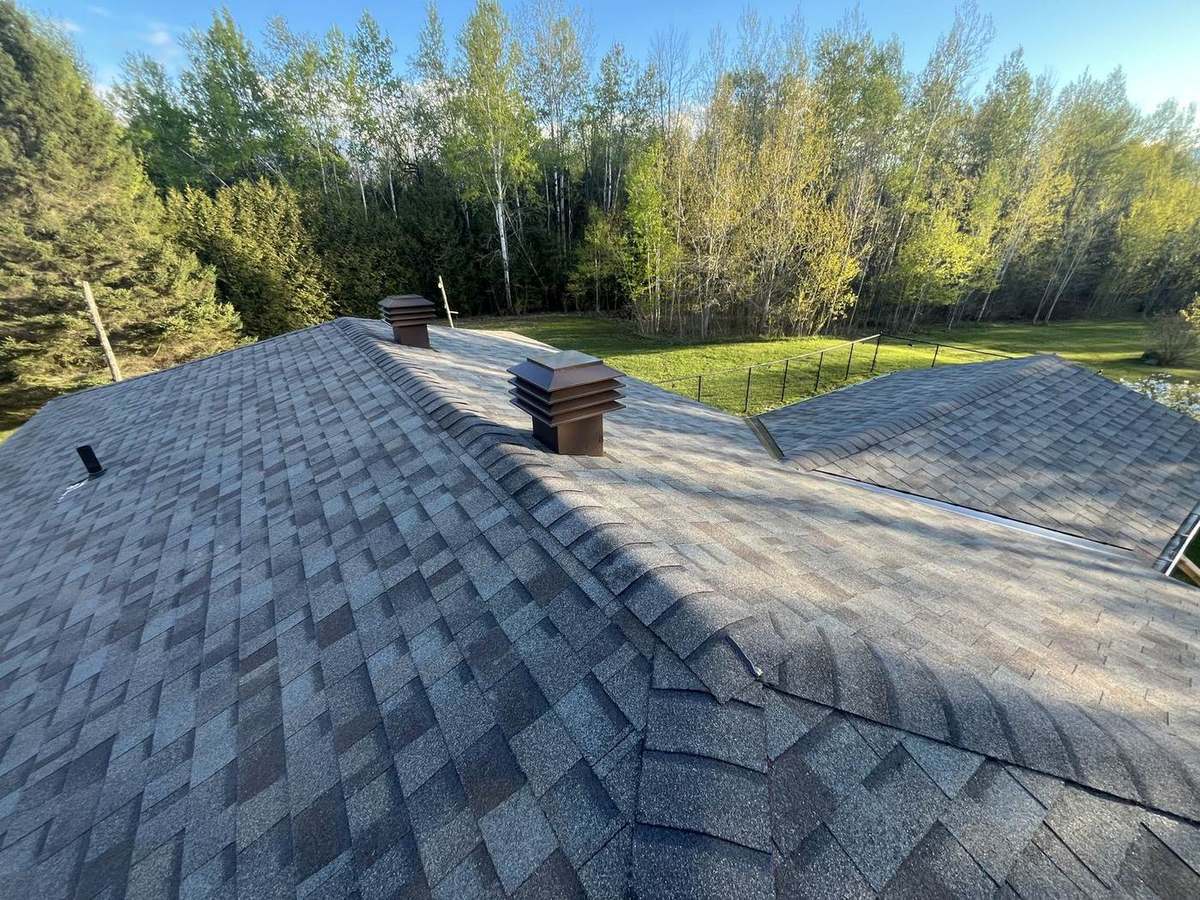 Driftwood asphalt shingle roof installed by Rob's Quality Roofing in the Ottawa region — project 8