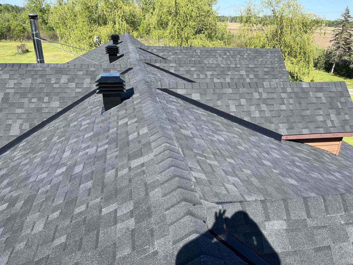 Onyx Black asphalt shingle roof installed by Rob's Quality Roofing in the Ottawa region — project 1