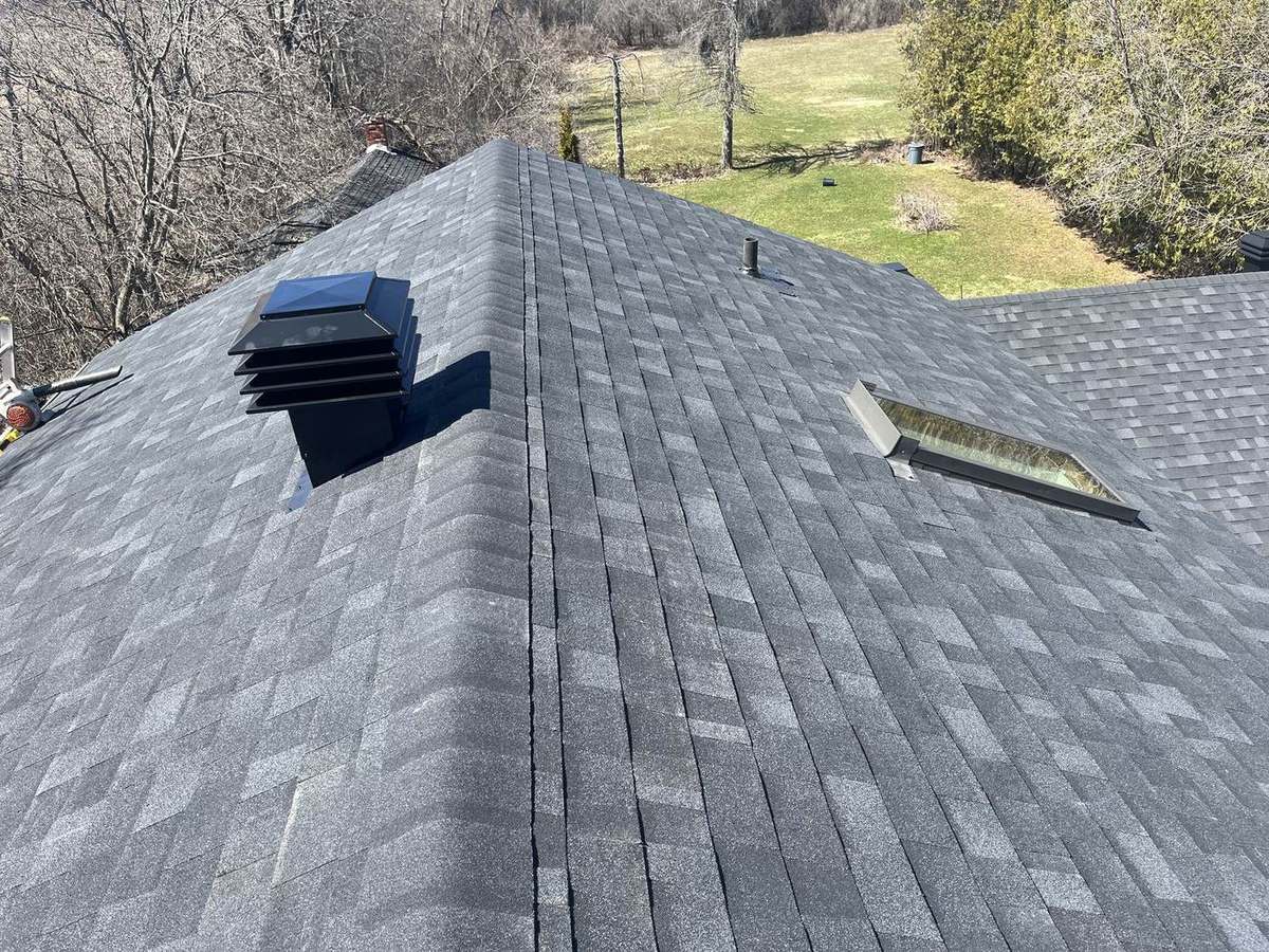 Onyx Black asphalt shingle roof installed by Rob's Quality Roofing in the Ottawa region — project 5