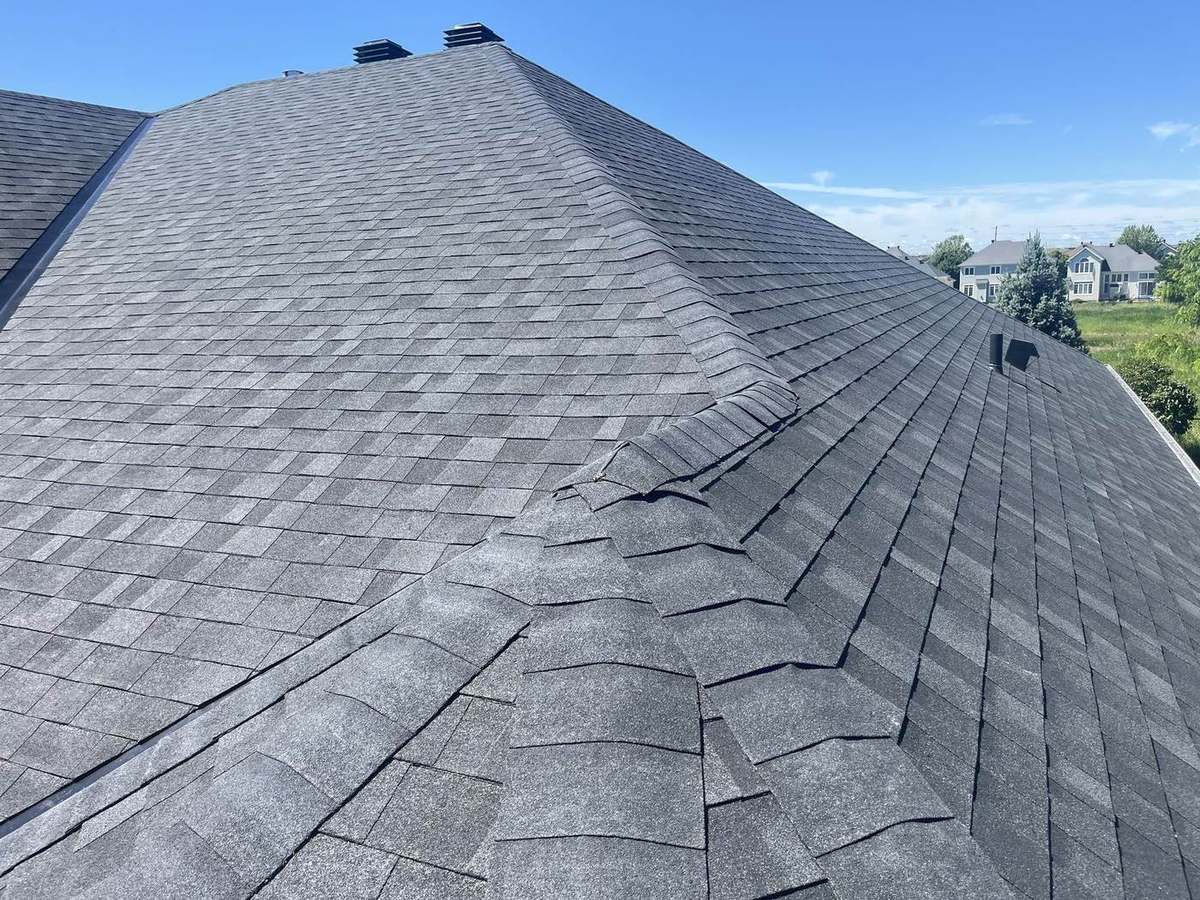 Onyx Black asphalt shingle roof installed by Rob's Quality Roofing in the Ottawa region — project 9