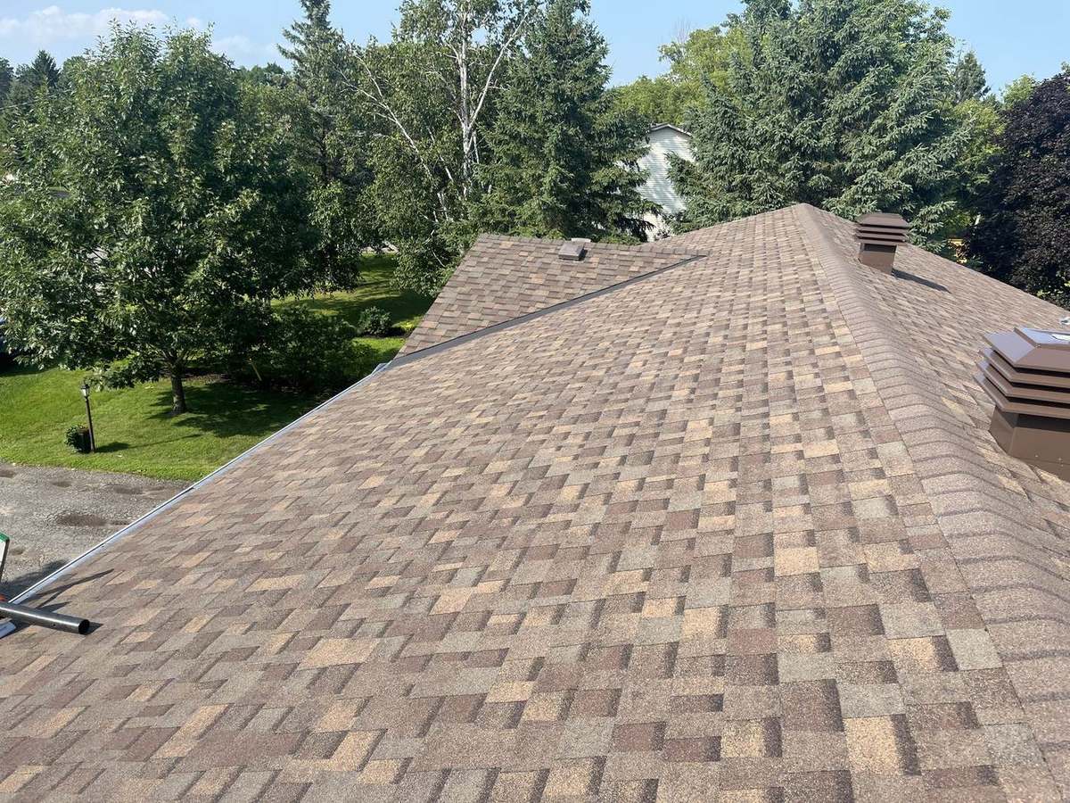 Teak asphalt shingle roof installed by Rob's Quality Roofing in the Ottawa region — project 2