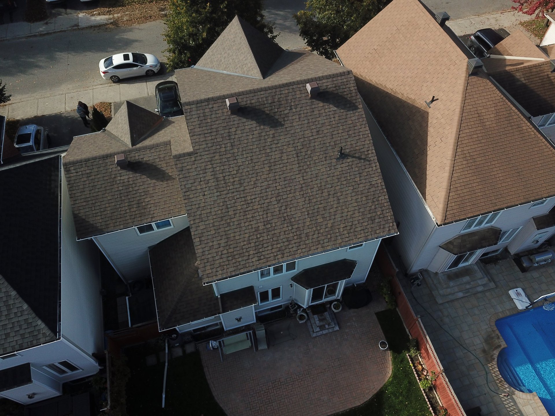 Completed asphalt shingle roof by Rob's Quality Roofing near Riverside South, Ontario